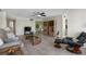 Comfortable living room featuring a large couch and recliner at 660 Island Way # 401, Clearwater, FL 33767