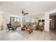 Spacious living room with tiled floors and large windows at 660 Island Way # 401, Clearwater, FL 33767