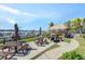 Community patio with picnic tables and grilling station overlooking the marina at 660 Island Way # 401, Clearwater, FL 33767