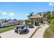 Waterfront patio with picnic tables and grilling station at 660 Island Way # 401, Clearwater, FL 33767