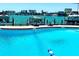 Inviting community pool with waterline and waterfront views at 660 Island Way # 401, Clearwater, FL 33767