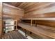 Clean and spacious sauna with wooden benches and walls at 660 Island Way # 401, Clearwater, FL 33767
