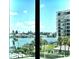 Stunning water view of the marina and neighboring waterfront homes at 660 Island Way # 401, Clearwater, FL 33767