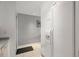 A bright kitchen with white appliances, countertops, and cabinets at 7000 Beach Plz # 505, St Pete Beach, FL 33706