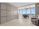 Light and airy living room with large windows offering stunning ocean views at 7000 Beach Plz # 505, St Pete Beach, FL 33706