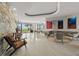 Lobby area with tile flooring, coastal decor, and views of the grounds at 7000 Beach Plz # 505, St Pete Beach, FL 33706