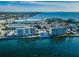 Aerial perspective of waterfront buildings and surroundings at 300 Woodette Dr # 202B, Dunedin, FL 34698