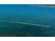 Aerial view of boat on calm ocean water at 300 Woodette Dr # 202B, Dunedin, FL 34698