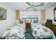 Guest bedroom with twin beds, offering water views at 300 Woodette Dr # 202B, Dunedin, FL 34698
