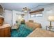 Guest bedroom with two twin beds and a desk at 300 Woodette Dr # 202B, Dunedin, FL 34698