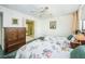 Guest bedroom with twin beds and a dresser at 300 Woodette Dr # 202B, Dunedin, FL 34698