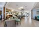 Common area with dining and seating areas at 300 Woodette Dr # 202B, Dunedin, FL 34698