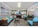 Common area features seating, fireplace, and artwork at 300 Woodette Dr # 202B, Dunedin, FL 34698