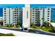 Building exterior showcasing the name and location at 300 Woodette Dr # 202B, Dunedin, FL 34698