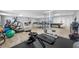 Fitness center with various equipment, including treadmills and weights at 300 Woodette Dr # 202B, Dunedin, FL 34698