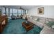 Spacious living room with water views at 300 Woodette Dr # 202B, Dunedin, FL 34698