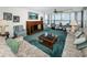 Spacious living room with ample natural light and water view at 300 Woodette Dr # 202B, Dunedin, FL 34698