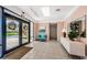 Building lobby with seating and decorations at 300 Woodette Dr # 202B, Dunedin, FL 34698