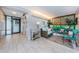 Building lobby with comfortable seating area at 300 Woodette Dr # 202B, Dunedin, FL 34698