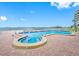 Relaxing waterfront pool and spa area at 300 Woodette Dr # 202B, Dunedin, FL 34698