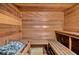 Clean sauna with wooden walls and benches at 300 Woodette Dr # 202B, Dunedin, FL 34698