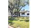 Charming single story home nestled under large shade trees at 1800 Montana Ne Ave, St Petersburg, FL 33703