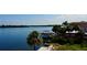 Beautiful waterfront lot, with a dock and boat lift, offering a serene coastal lifestyle at 2121 Bayou Grande Ne Blvd, St Petersburg, FL 33703