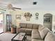 Inviting living room with comfortable seating and stylish decor at 1172 Chelsea Ln, Holiday, FL 34691