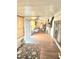 Spacious sun room with multiple windows and sliding glass door at 1172 Chelsea Ln, Holiday, FL 34691