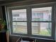 Double-paned window offering great natural light and views of the surrounding yard and neighborhood for a peaceful ambiance at 1172 Chelsea Ln, Holiday, FL 34691