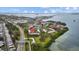 Aerial view of residences with convenient highway access, green spaces, and picturesque waterfront views at 2700 Bayshore Blvd # 2C/578, Dunedin, FL 34698