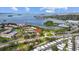 A beautiful aerial view of the residences offering access to the waterfront with mature landscaping at 2700 Bayshore Blvd # 2C/578, Dunedin, FL 34698