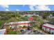 An aerial view of well-maintained townhomes with ample parking and mature landscaping at 2700 Bayshore Blvd # 2C/578, Dunedin, FL 34698