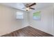 Well-lit bedroom featuring wood-look flooring at 10162 115Th Ave, Largo, FL 33773