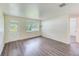Living room with hardwood floors and bay window at 10162 115Th Ave, Largo, FL 33773