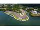 Waterfront condos offer private docks, a community pool, and lush landscaping at 163 Brent Cir, Oldsmar, FL 34677