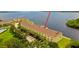 Townhome community featuring private parking, palm trees, and boat docks along the water at 163 Brent Cir, Oldsmar, FL 34677