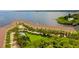 Aerial view of the property highlighting the community, pool, and waterfront location at 163 Brent Cir, Oldsmar, FL 34677