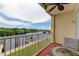 A balcony overlooking the water with seating, offering beautiful outdoor relaxation space at 163 Brent Cir, Oldsmar, FL 34677