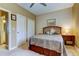 A cozy bedroom with a comfortable bed and ample closet space for storage at 163 Brent Cir, Oldsmar, FL 34677