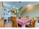 A spacious dining area with seating for six, open to kitchen and living areas at 163 Brent Cir, Oldsmar, FL 34677