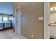 Hallway between main bedroom and bathroom featuring neutral colors at 163 Brent Cir, Oldsmar, FL 34677