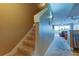 View of staircase and living room showcasing the home's interior layout and design at 163 Brent Cir, Oldsmar, FL 34677