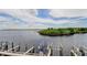 Gorgeous waterfront view from the property with boat slips available and stunning blue water at 163 Brent Cir, Oldsmar, FL 34677
