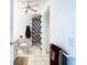 Bathroom featuring red-and-white patterned shower and coordinating towels at 2570 Gary Cir # 3, Dunedin, FL 34698