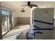 Spacious living room with partially renovated walls and access to a waterfront view at 2570 Gary Cir # 3, Dunedin, FL 34698