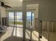 Renovation in progress with water view visible through sliding glass doors and exposed plumbing at 2570 Gary Cir # 3, Dunedin, FL 34698