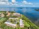 Aerial view of waterfront condos boasting coastal living and scenic water views at 2700 Bayshore Blvd # 559, Dunedin, FL 34698