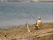 Picturesque scene of someone relaxing and fishing along the tranquil beach at 2700 Bayshore Blvd # 559, Dunedin, FL 34698