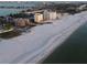 Aerial view of beachfront property and surrounding area at 5000 Gulf Blvd # 704, St Pete Beach, FL 33706